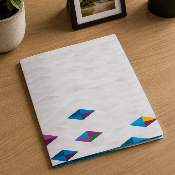 Real estate development marketing brochure with geometric design — Blair and Co. print creative services aprtment sales Calgary