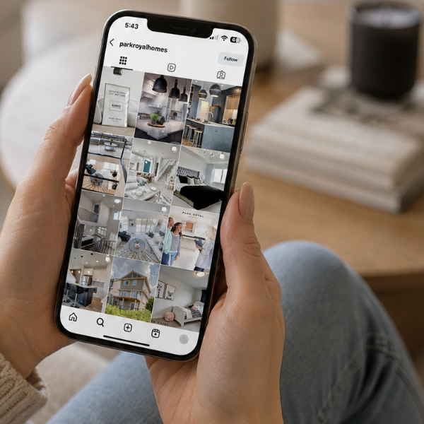 Single family home builder Edmonton social media content feed displayed on iPhone — Blair and Co. social media management